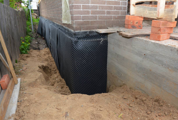SJ Waterproofing Pros technician performing targeted Waterproofing assessment in Oregon City, OR